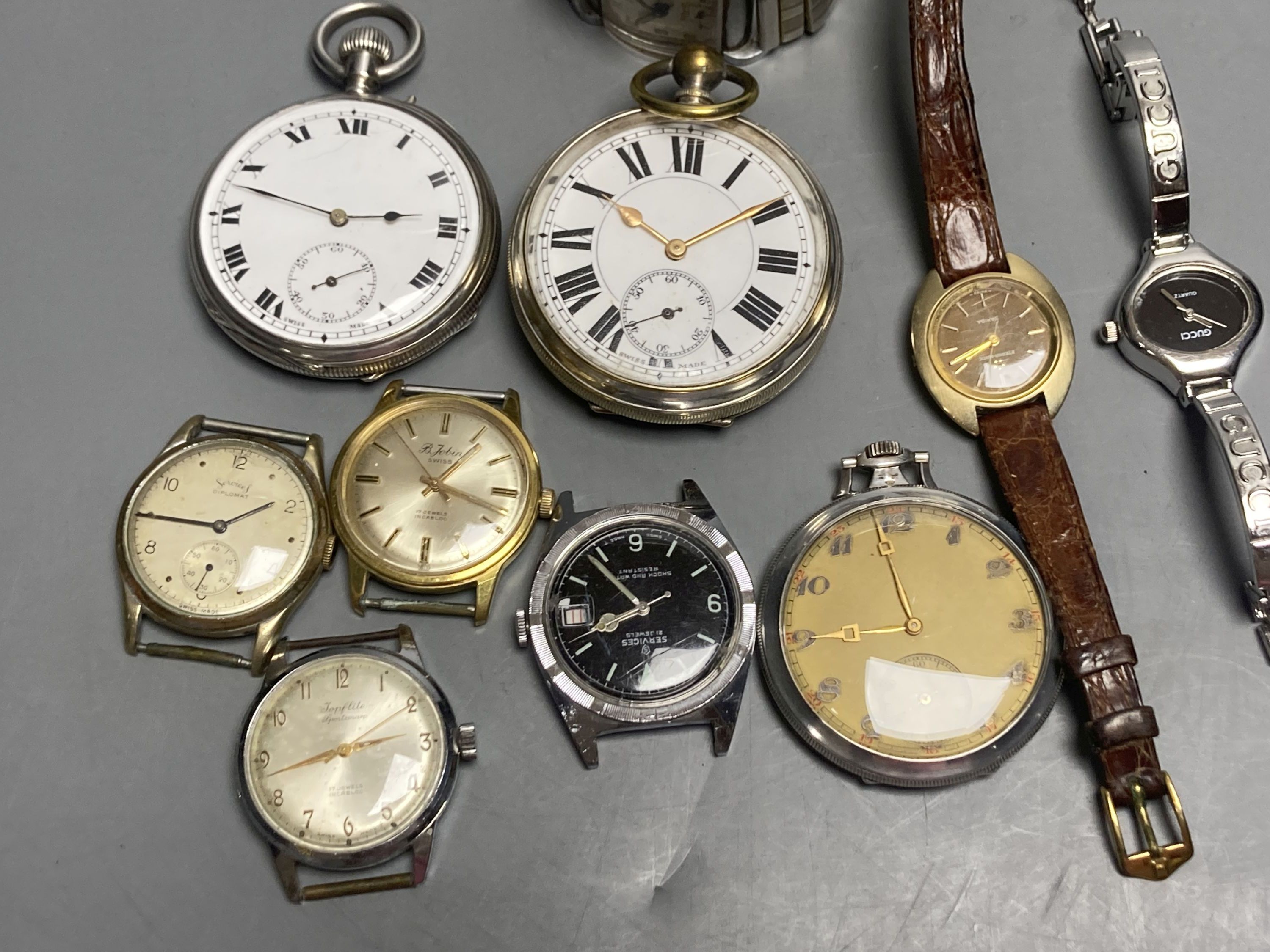 A Victorian white metal keyless pocket watch, two others and seven other wristwatches.